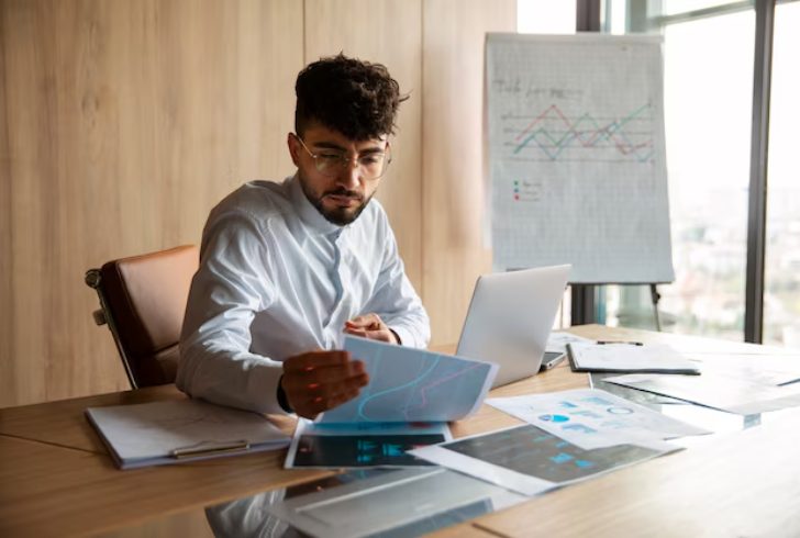Person feels relaxed while reviewing finances