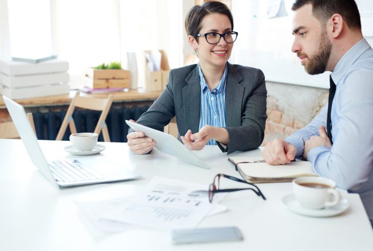 Person planning finances with advisor