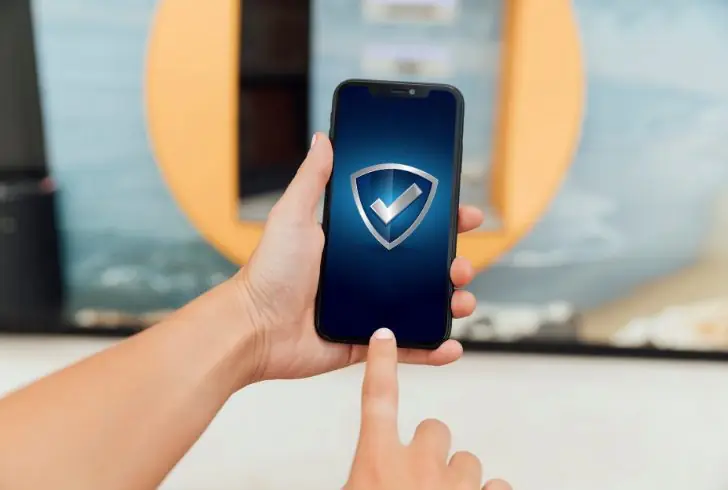 Phone showing finance security symbol