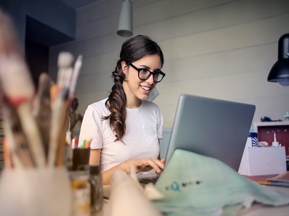 photo-of-woman-using-her-laptop